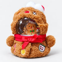 Gingerbread plush snow globe with a red scarf and a gingerbread man inside the dome