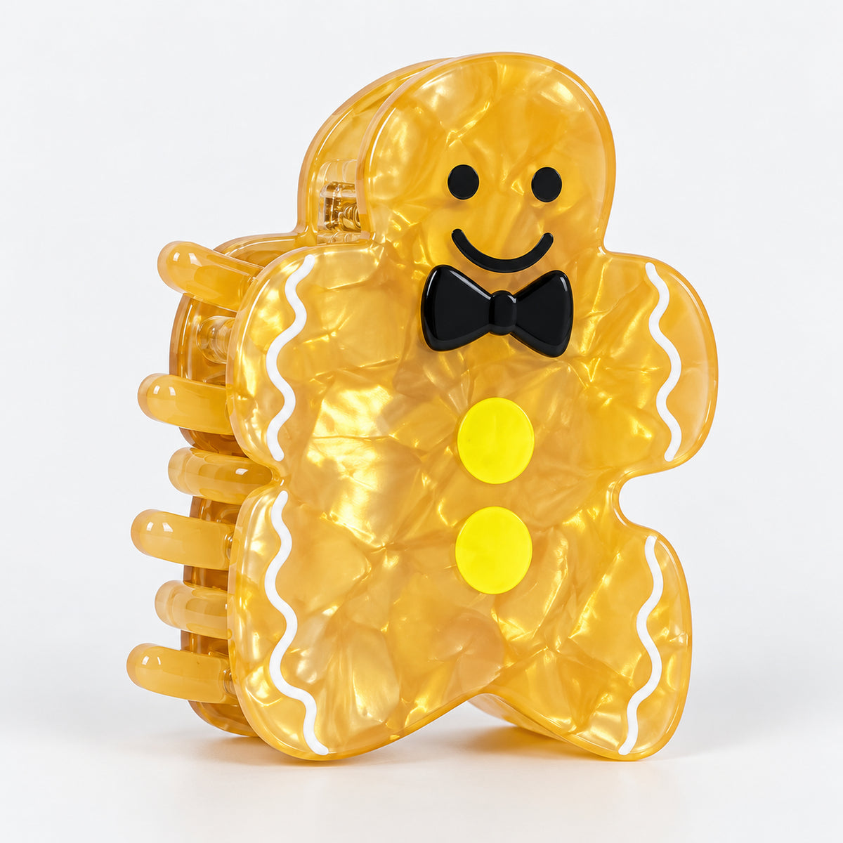 Gingerbread man Christmas claw hair clip with a bow tie and yellow buttons