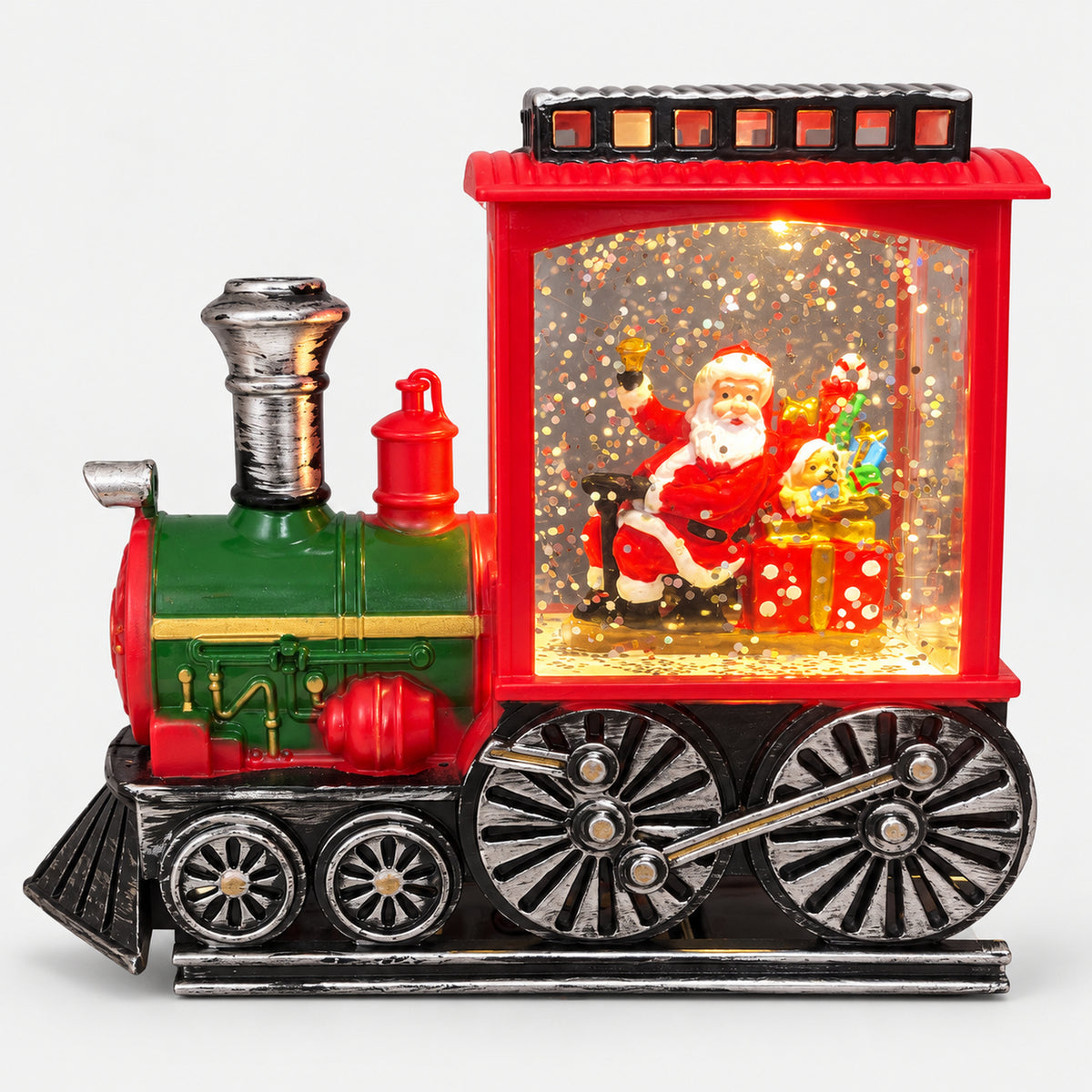 Christmas train LED decoration lit up, with Santa and gifts in the glitter cabin