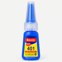 401 adhesive nail glue bottle with its cap on