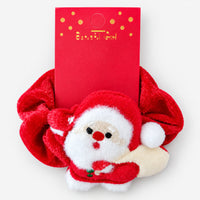 Santa plush scrunchie on a red display card