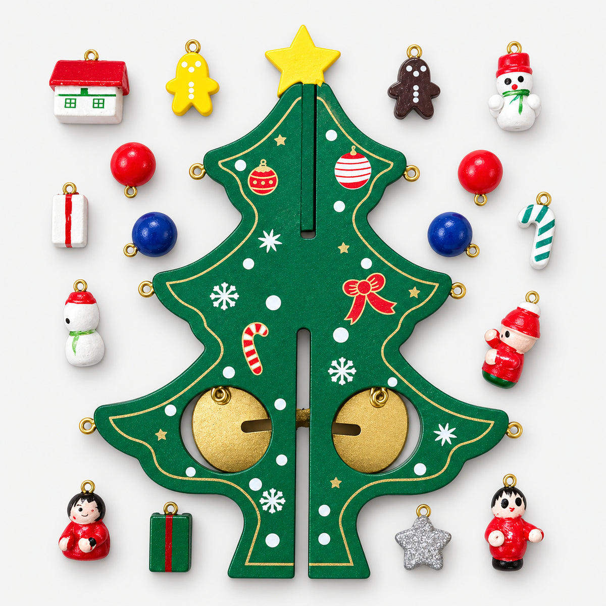 Christmas tree ornament kit with a green tabletop tree, gold bells and mini ornaments