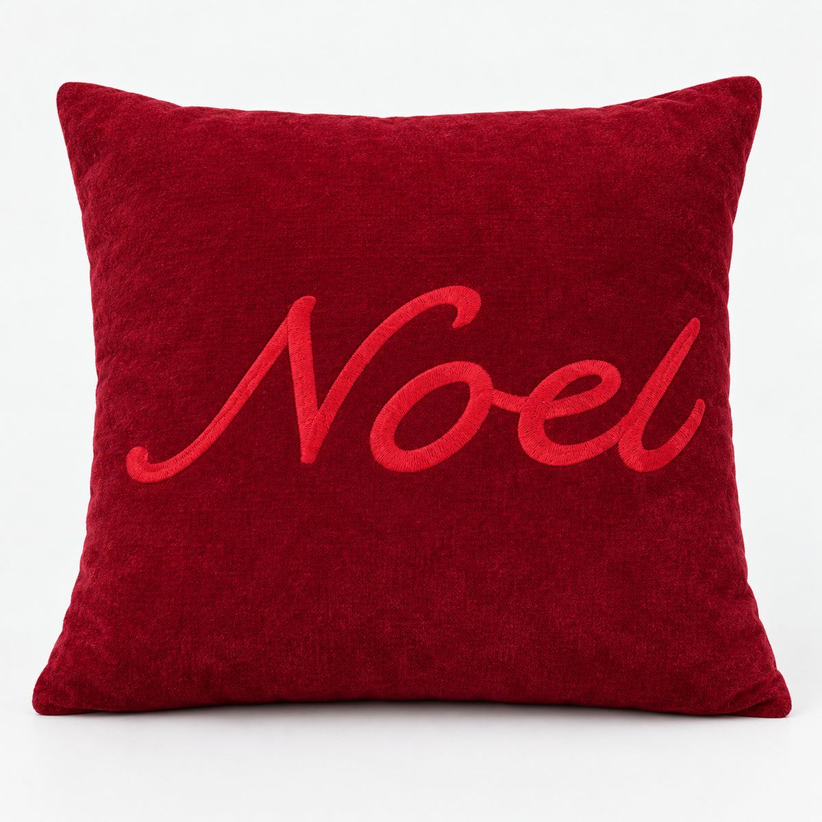 Red Christmas throw pillow with a raised Noel script