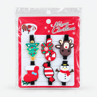 Reindeer and snowman Christmas hair clip set on a Merry Christmas card