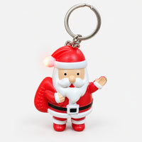 Santa Christmas keychain with its LED light on