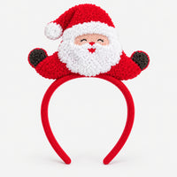 Red Christmas headband with a fluffy smiling Santa on top