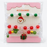Christmas beaded bracelet set on its pink display card