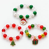 Set of 3 Christmas beaded bracelets with Santa, Christmas tree and gift box charms