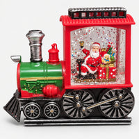 Red and green Christmas train decoration with Santa, light off