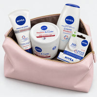 Repair and care body gift set: hand cream, body cream jar, shower gel and lip balm in a pink cosmetic bag