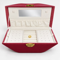Burgundy kiss jewelry case open with mirror, ring rolls and earring panels