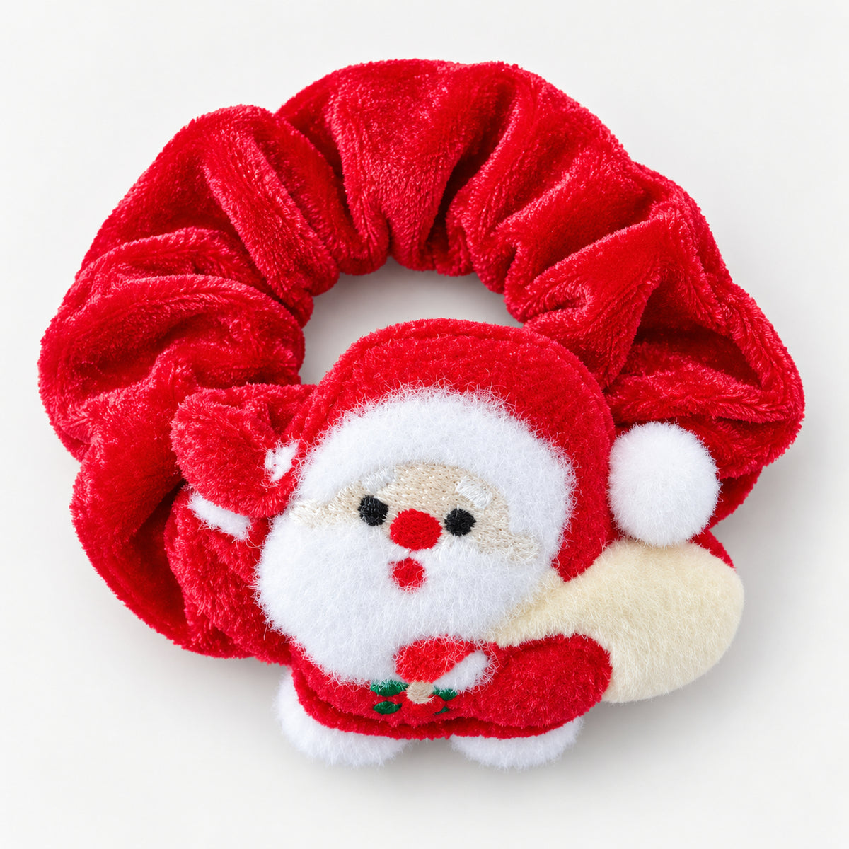 Red velvet scrunchie with a plush Santa carrying a sack