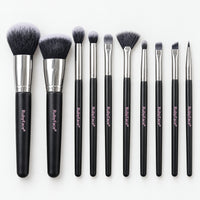 10 black makeup brushes with silver ferrules, from large face brushes to fine eye brushes