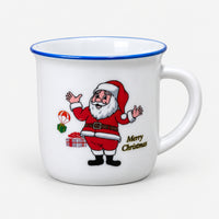 White Christmas mini mug with a blue rim and Santa with his arms up
