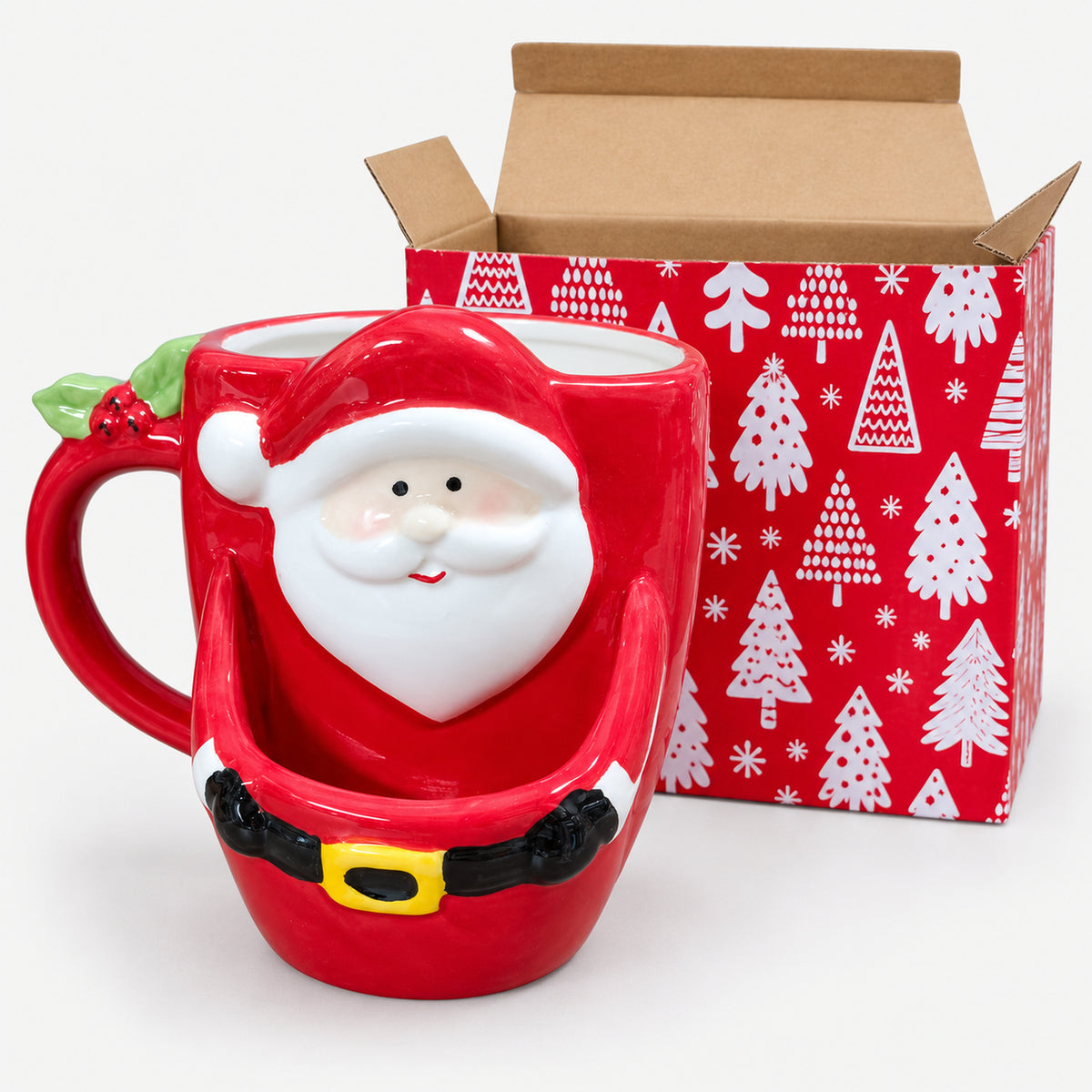 Santa cookie mug next to its red Christmas tree print gift box