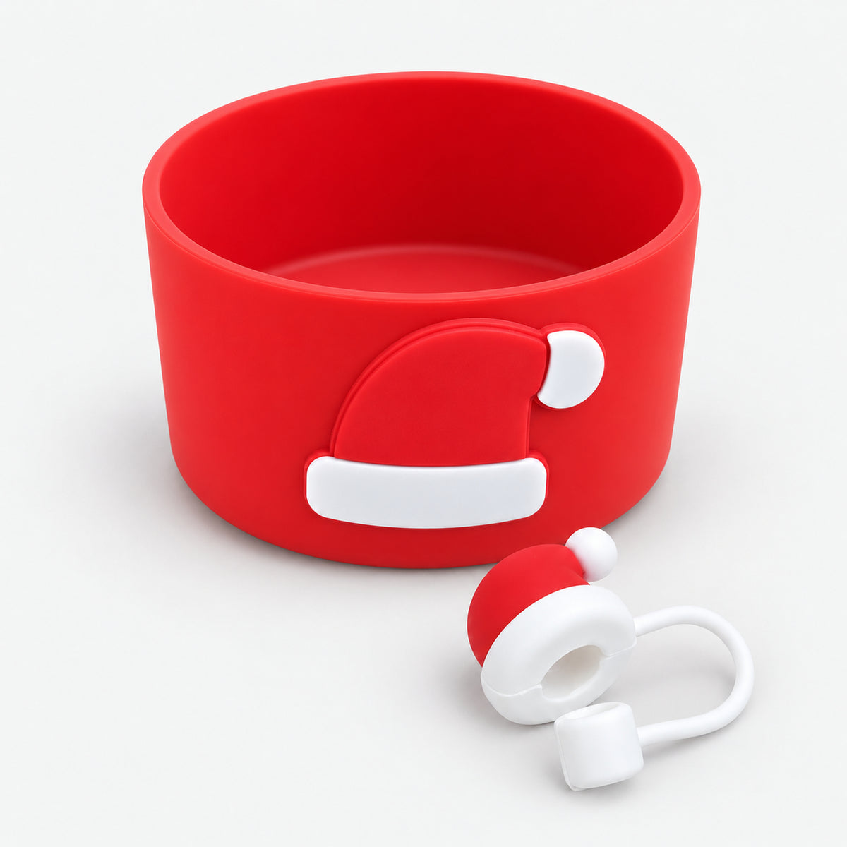 Red silicone tumbler boot with Santa hat and matching straw topper