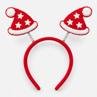 Red Christmas headband with two bouncy Santa hats on springs