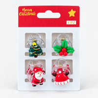 Santa and holly Christmas mini hair clips on a Merry Christmas card