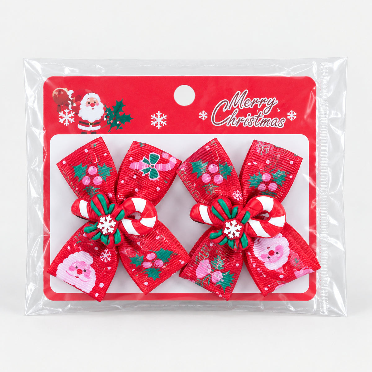 Candy cane Christmas bow hair clips on a Merry Christmas card