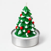 Snowy Christmas tree tea light candle with red berries