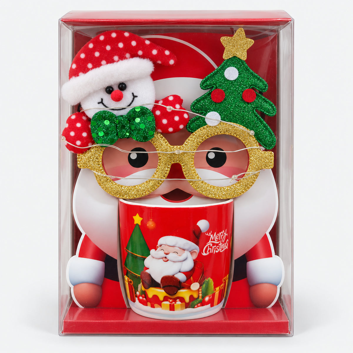 Christmas mug with red Santa on gifts design and party glasses in a gift box