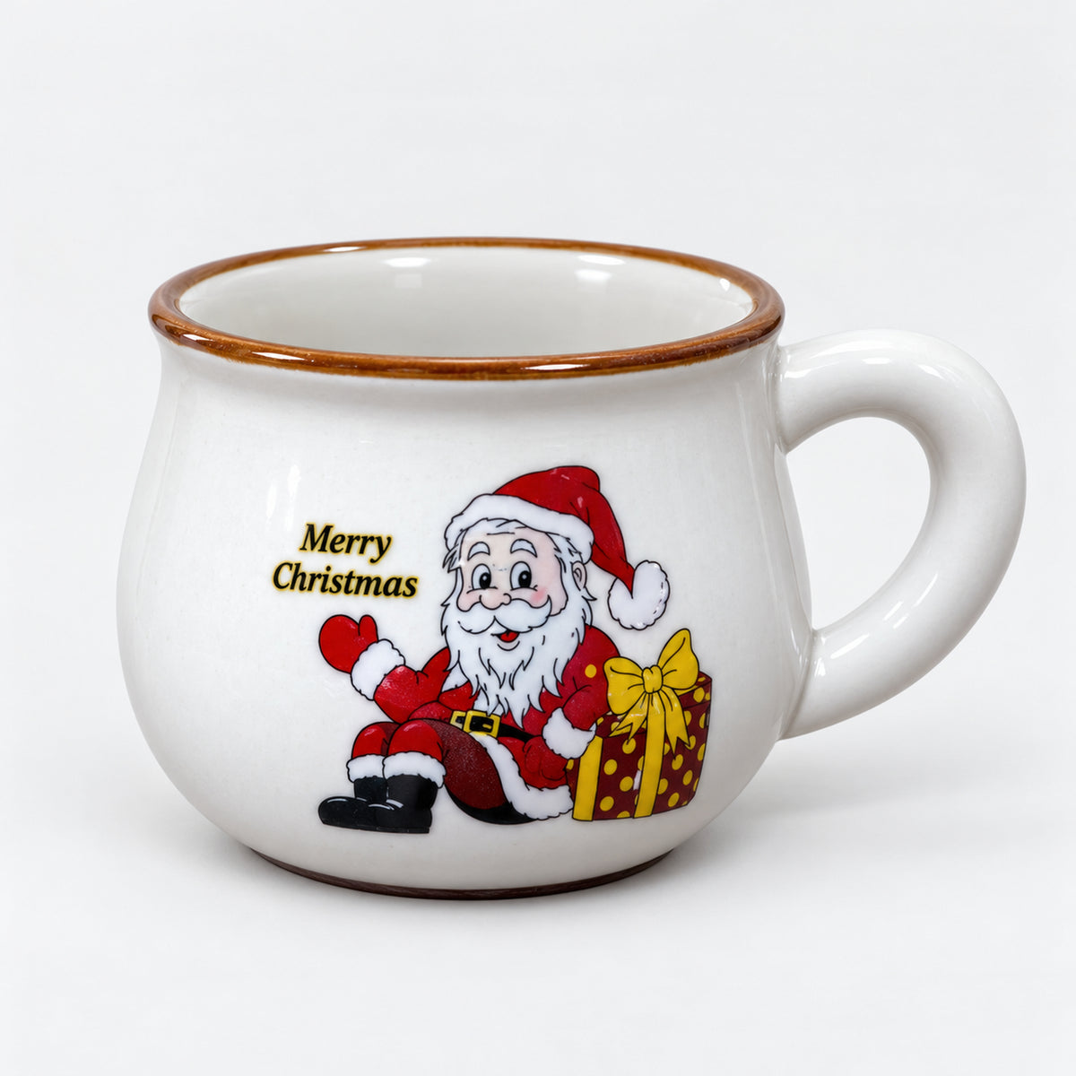 White rounded Christmas mug with Santa next to a burgundy gift