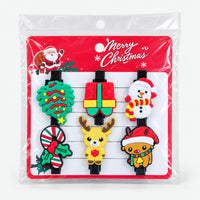 Snowman and gift Christmas hair clip set on a Merry Christmas card
