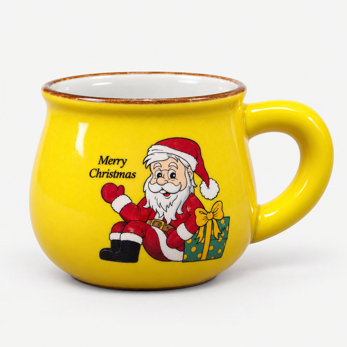 Yellow rounded Christmas mug with Santa and a green gift