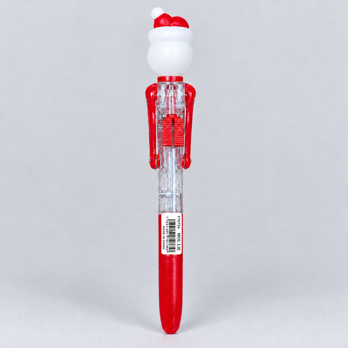 Back of the clear Santa boxing pen showing the punching mechanism