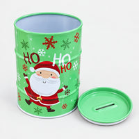 Green Santa Christmas money tin open, with its money slot lid off