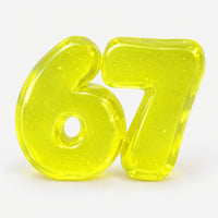 Surprise 67 squishy in yellow glitter