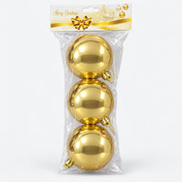 Pack of 3 shiny gold Christmas balls, 10 cm, in its Merry Christmas bag