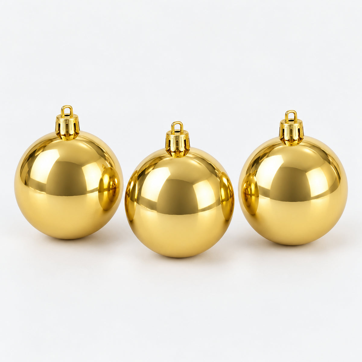 3 shiny gold Christmas balls, 10 cm each