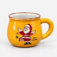 Mustard rounded Christmas mug with Santa arms up