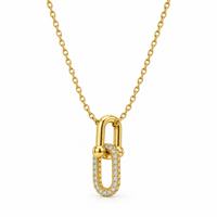 Gold-tone lock necklace with a smooth link interlocked with a sparkling stone-lined oval link