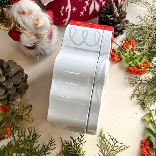 Santa face Christmas tin box, side view