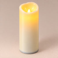 Ivory LED pillar candle, 20 cm, switched on with a warm flickering flame