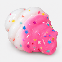 Ice cream swirl squishy in pink with sprinkles and star confetti