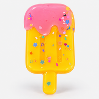 Popsicle squishy in yellow with sprinkles and flower confetti
