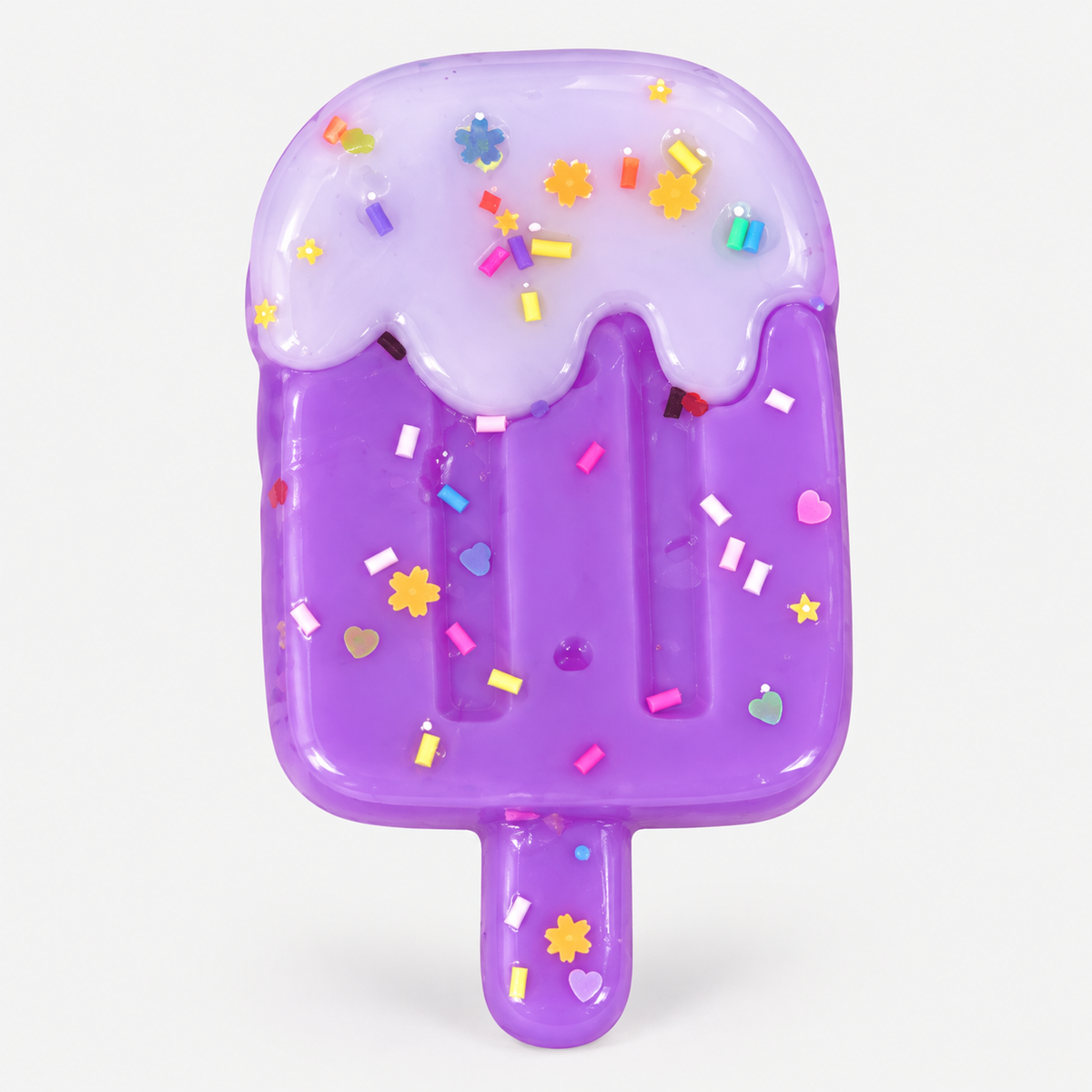Popsicle squishy in purple with sprinkles and flower confetti