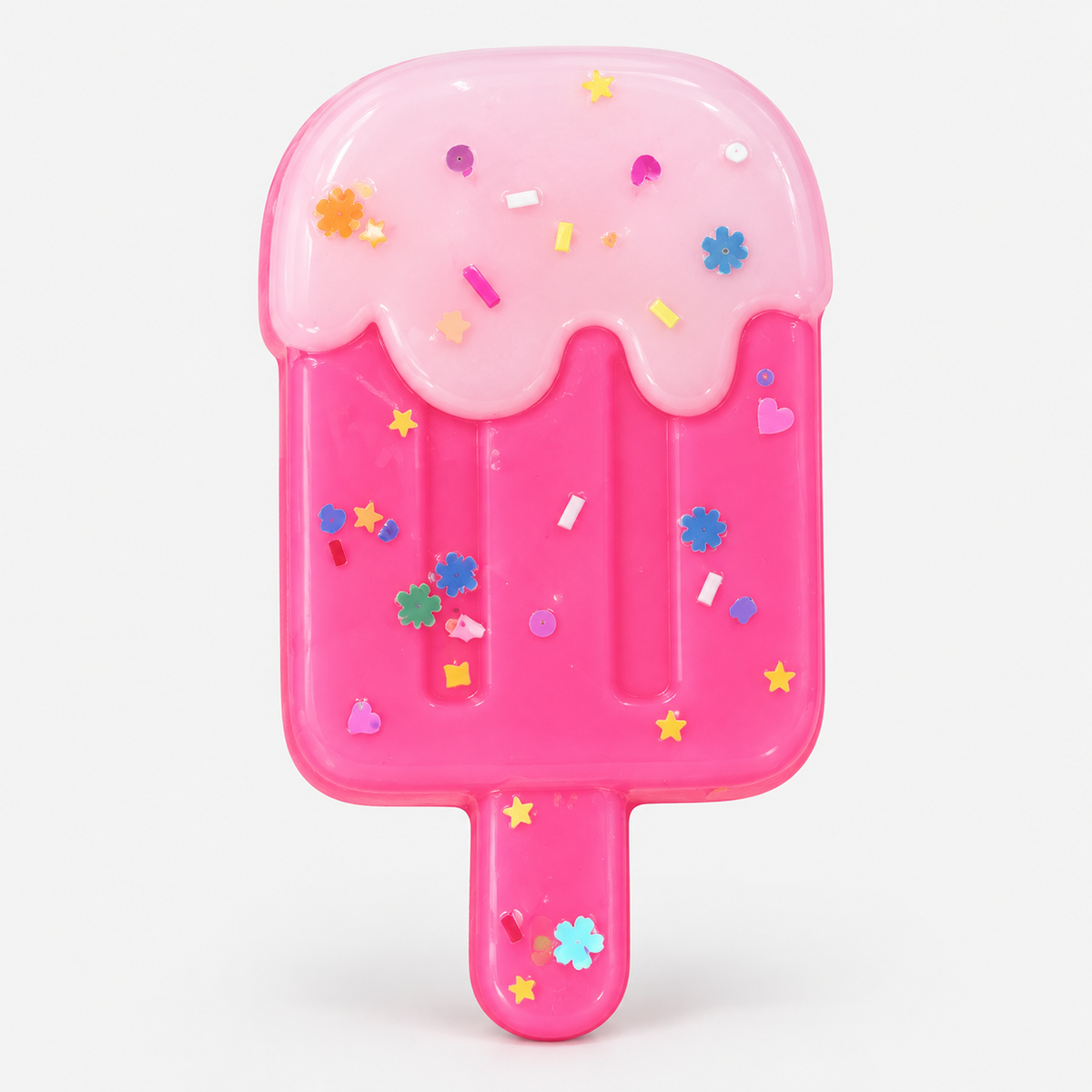 Popsicle squishy in pink with sprinkles and flower confetti