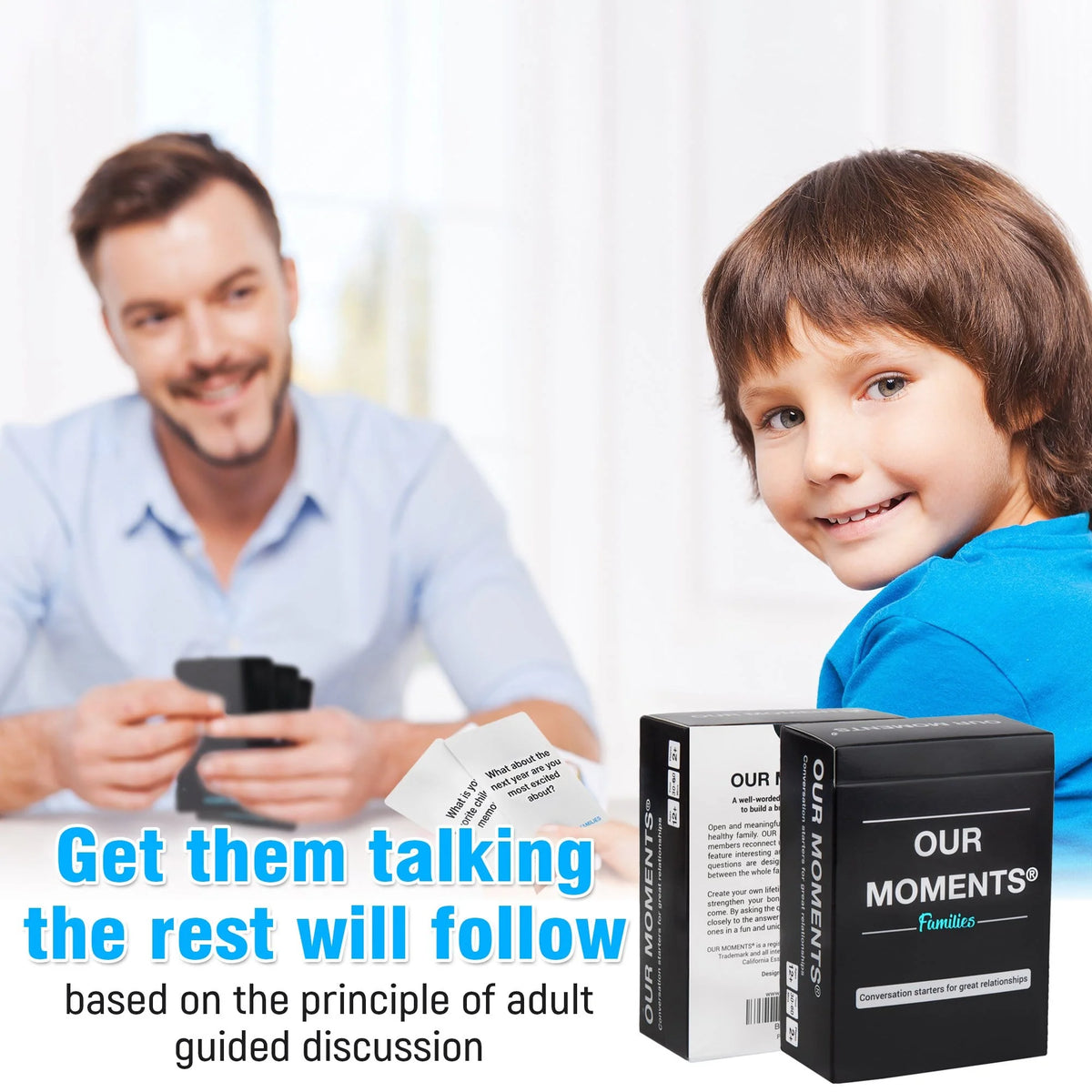 Father and son talking with OUR MOMENTS Families cards