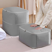 Compression storage bags full and zipped down on a bed