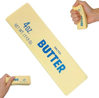 Butter stick squishy next to a hand to show its size