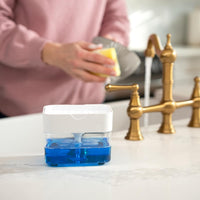 Dish soap dispenser with sponge caddy