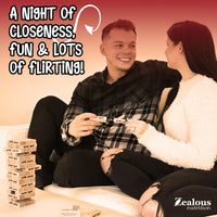 Couple laughing while playing the block tower dare game