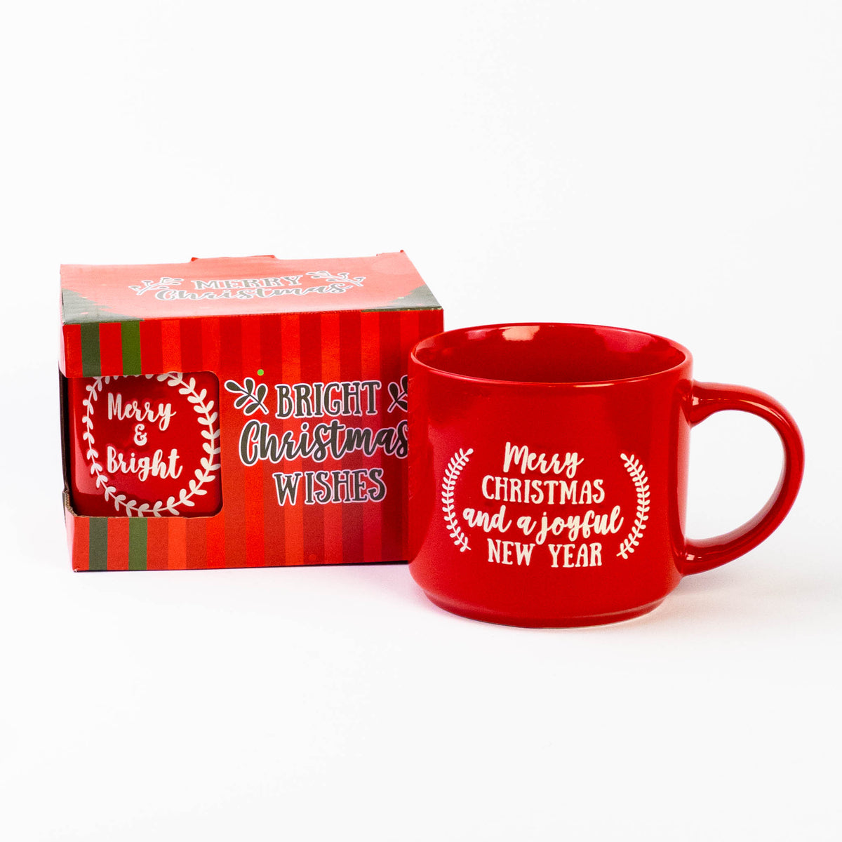 Red Christmas quote mug "Merry Christmas and a Joyful New Year" next to its gift box
