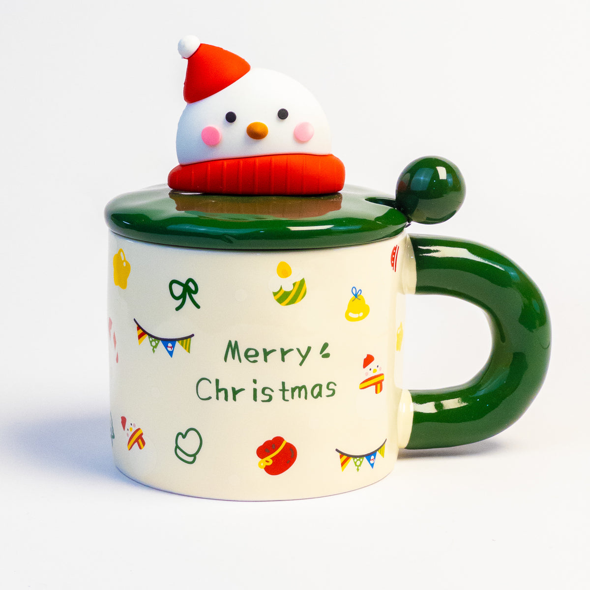 Snowman lid Christmas mug, side view with spoon resting on the lid