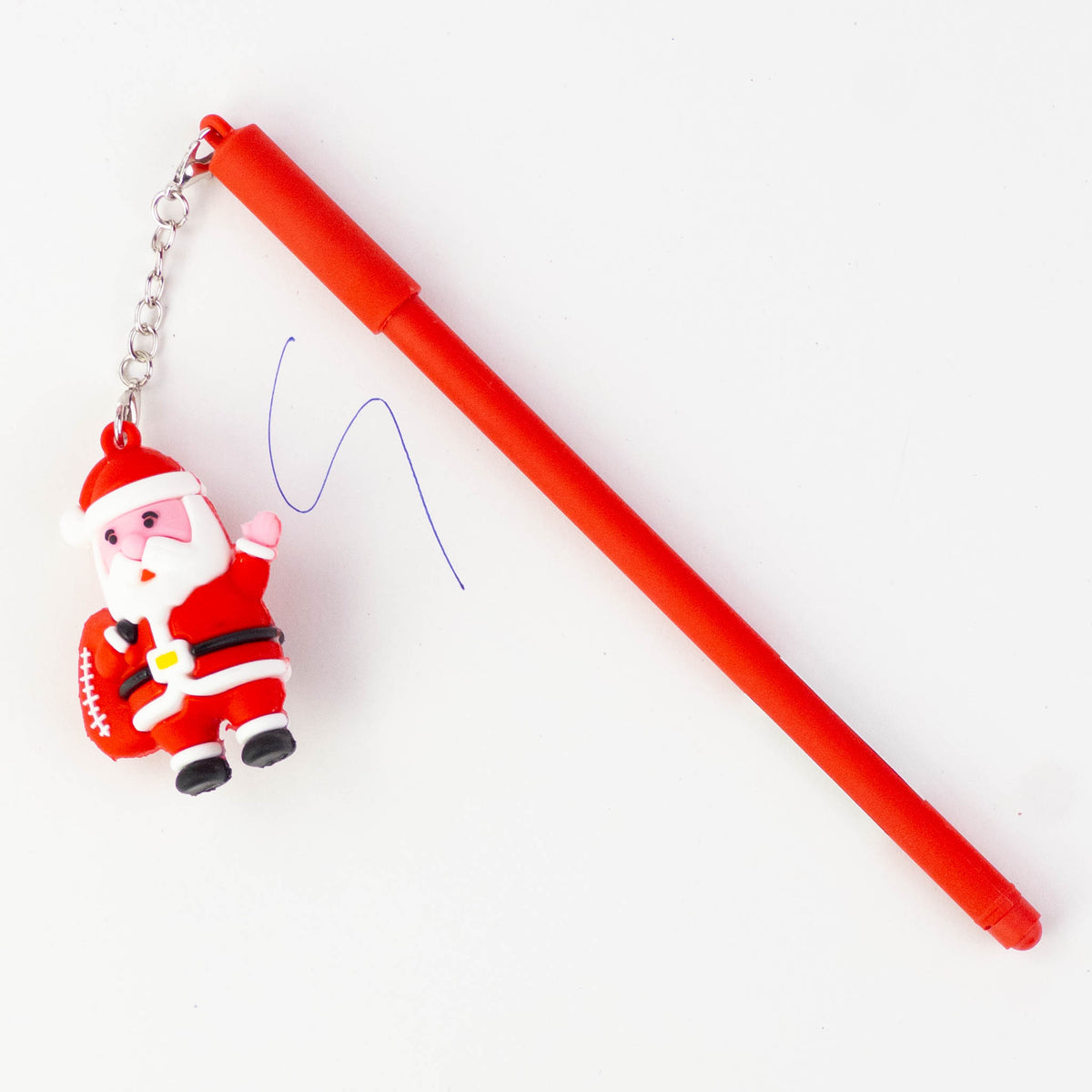 Red Christmas pen with a Santa keychain charm