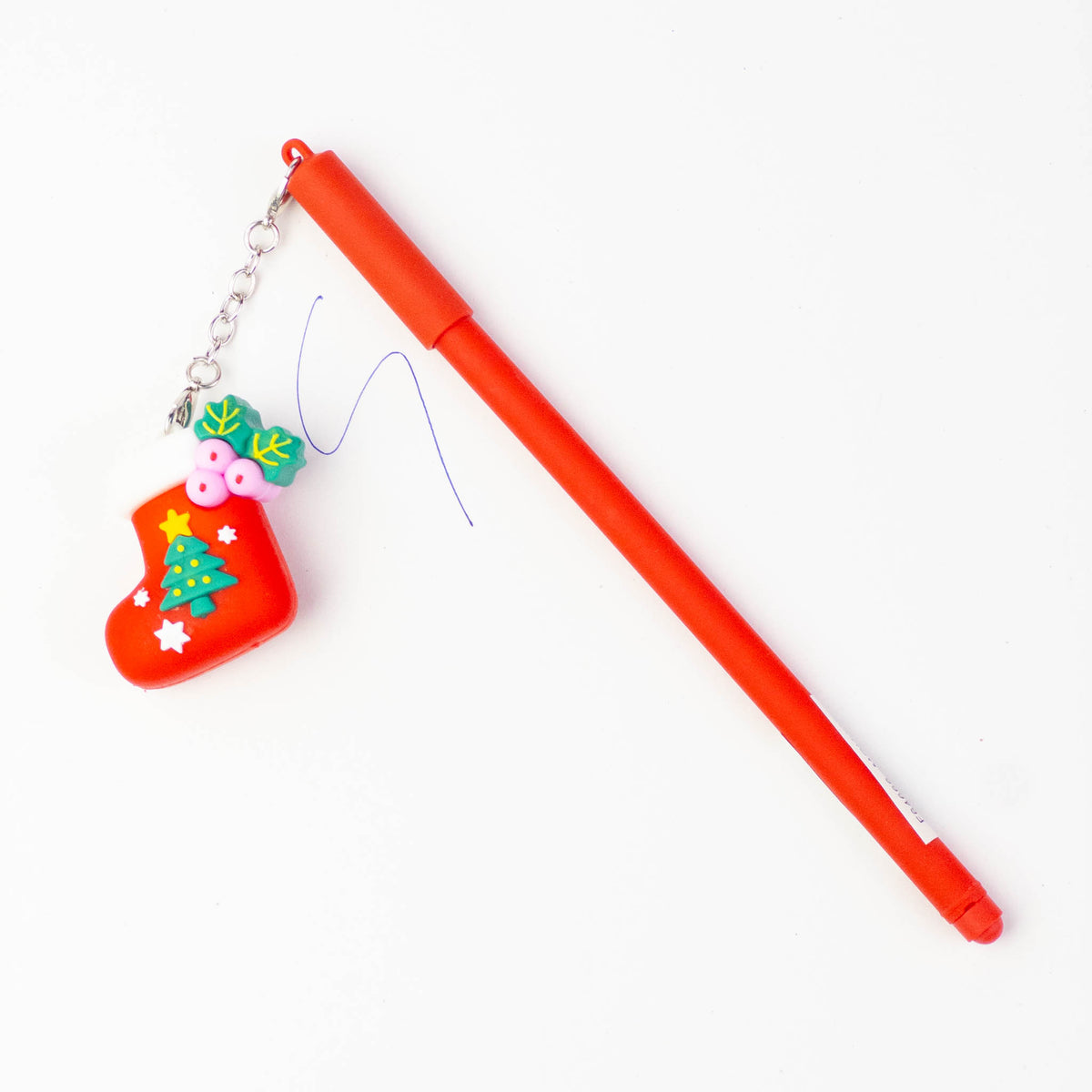 Red Christmas pen with a stocking keychain charm